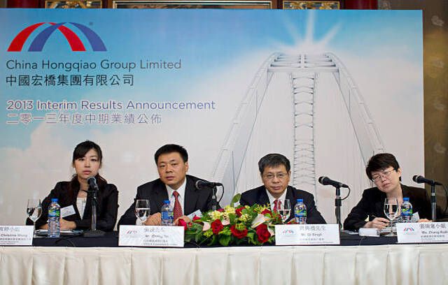 Kiinan Hongqiao Group, Ltd: n johtajat osallistua yhtiön tulosuudistukseen Hongkongissa, Kiinassa